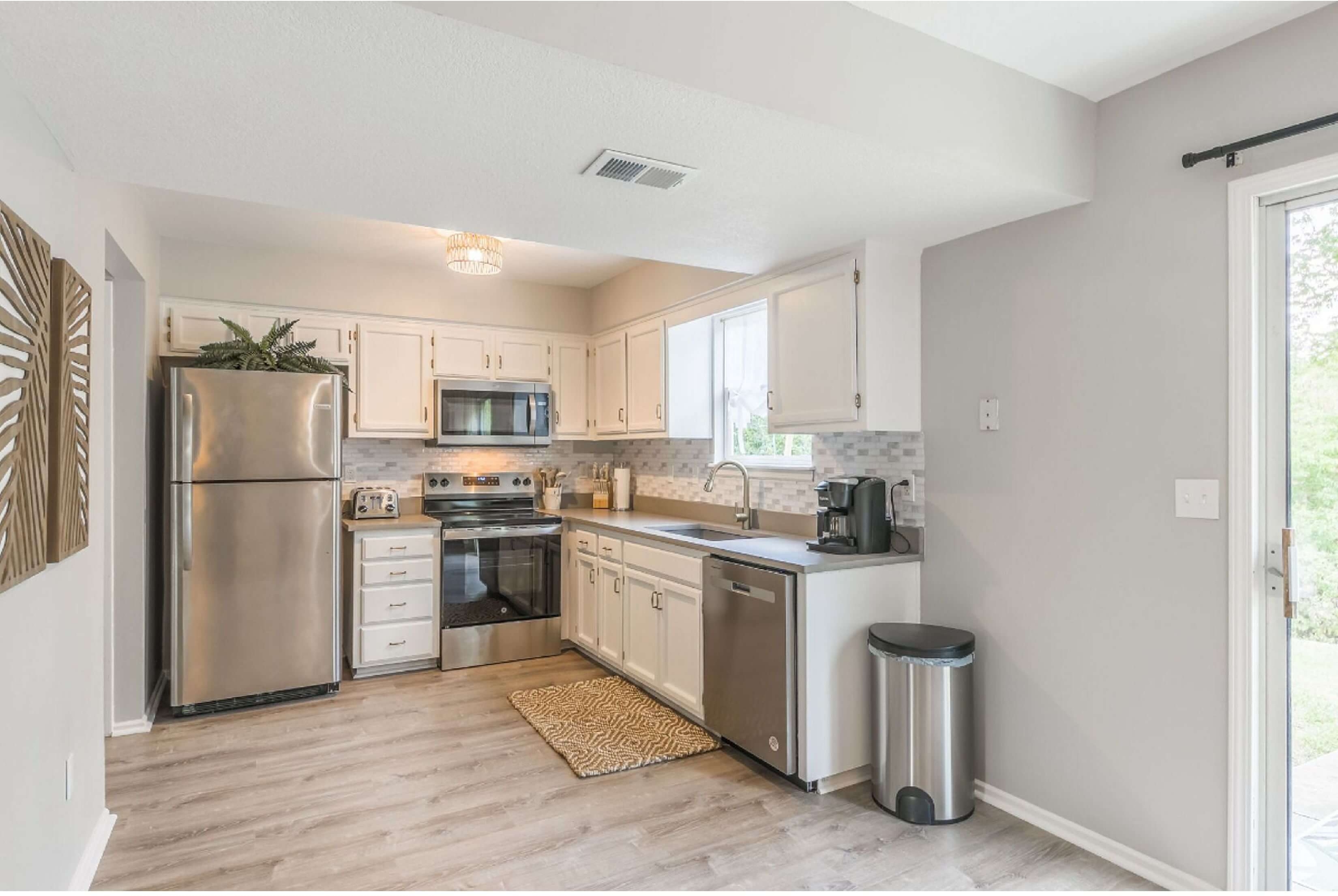 Full kitchen in furnished Kansas City World Cup rental